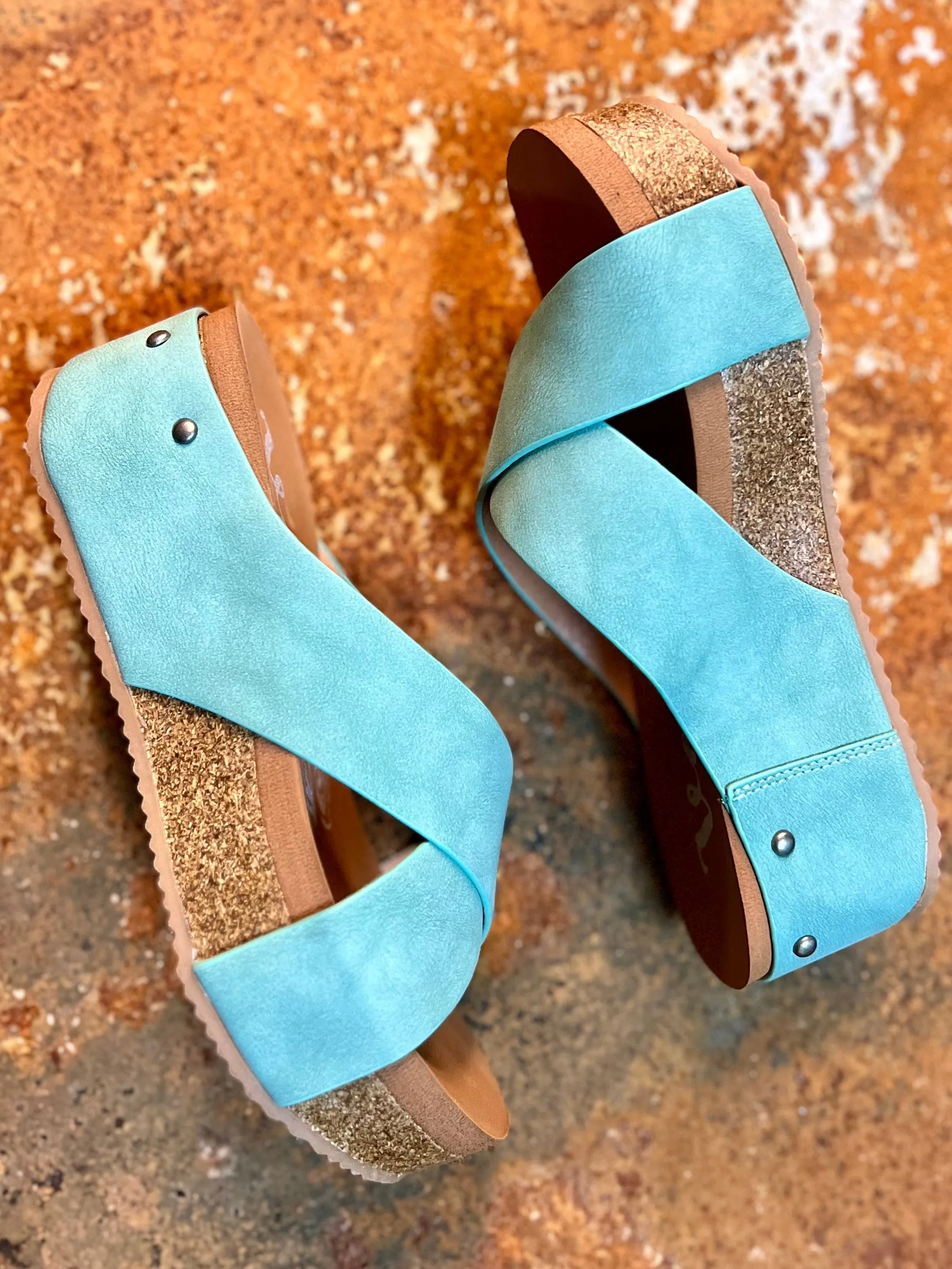 Crossed Paths Turquoise Sandals*